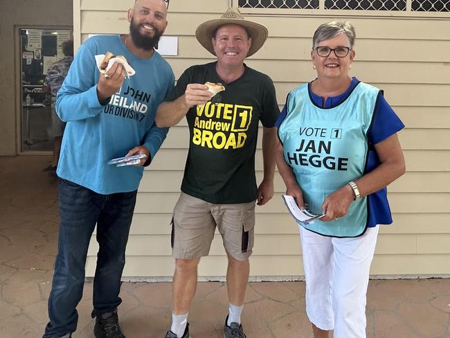 Division 7 candidates John Weiland, Andrew Broad and Jan Hegge having a democracy sausage together.