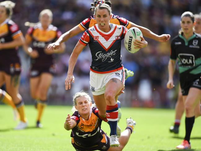 Samantha Bremner bursts through the Brisbane defence. Picture NRL Photos