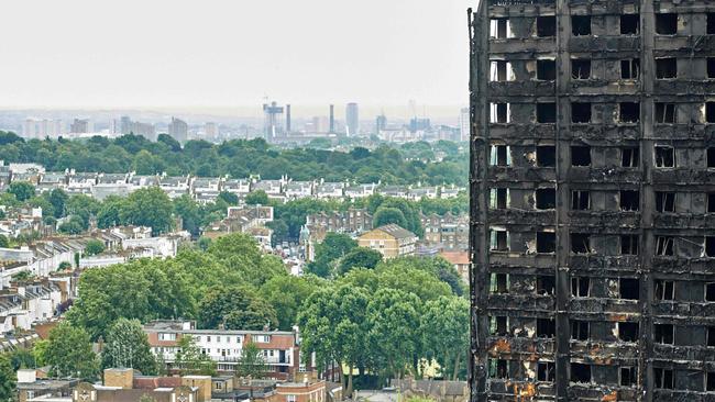 The charred remains of cladding are pictured on the outer walls of the burnt out shell of the Grenfell Tower block. Picture: Niklas Halle’n