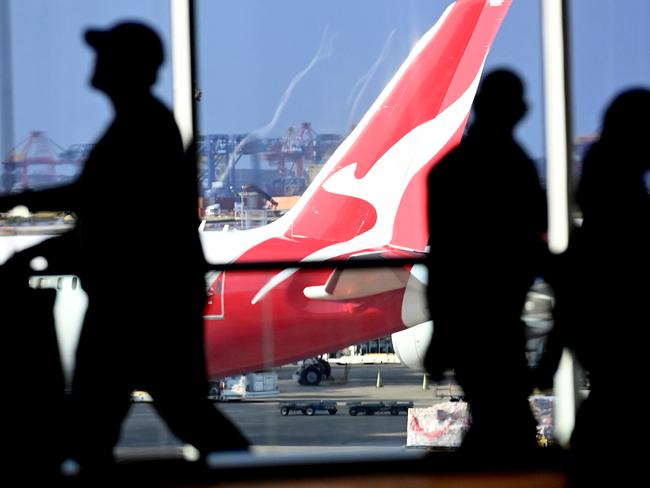 SYDNEY, AUSTRALIA - NewsWire Photos JULY 29, 2022: General scenes of a Qantas plane at the arrival gate at SydneyÃs International AirportPicture: NCA NewsWire / Jeremy Piper