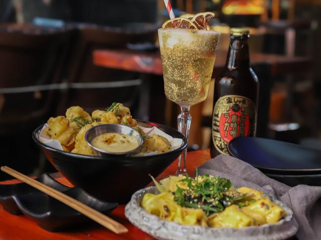 Mamasan’s popcorn shrimp, dumplings and cocktails. Picture: Jenifer Jagielski