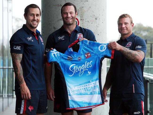 Mitchell Pierce, Boyd Cordner and Jake Friend with the sponsor-heavy jersey.