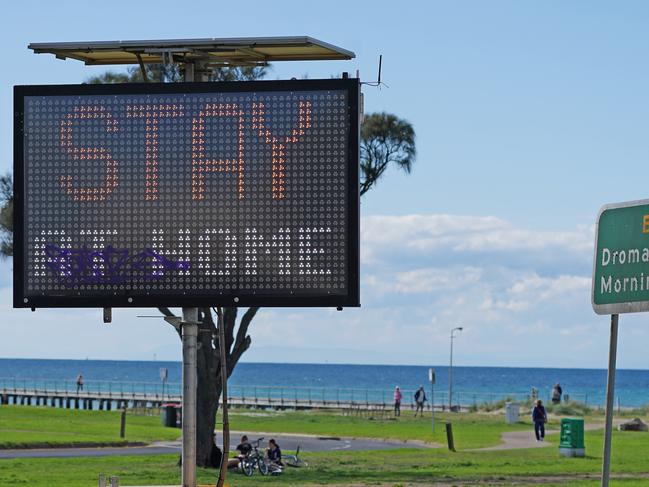 A Stay at Home sign is seen in Rye, Sunday, April 19, 2020. Authorities have said social distancing and isolation measures could still remain in place for the next six months.  A shutdown of non-essential services is in effect Australia wide in a bid to slow the spread of the coronavirus (COVID-19) disease.  (AAP Image/Scott Barbour) NO ARCHIVING