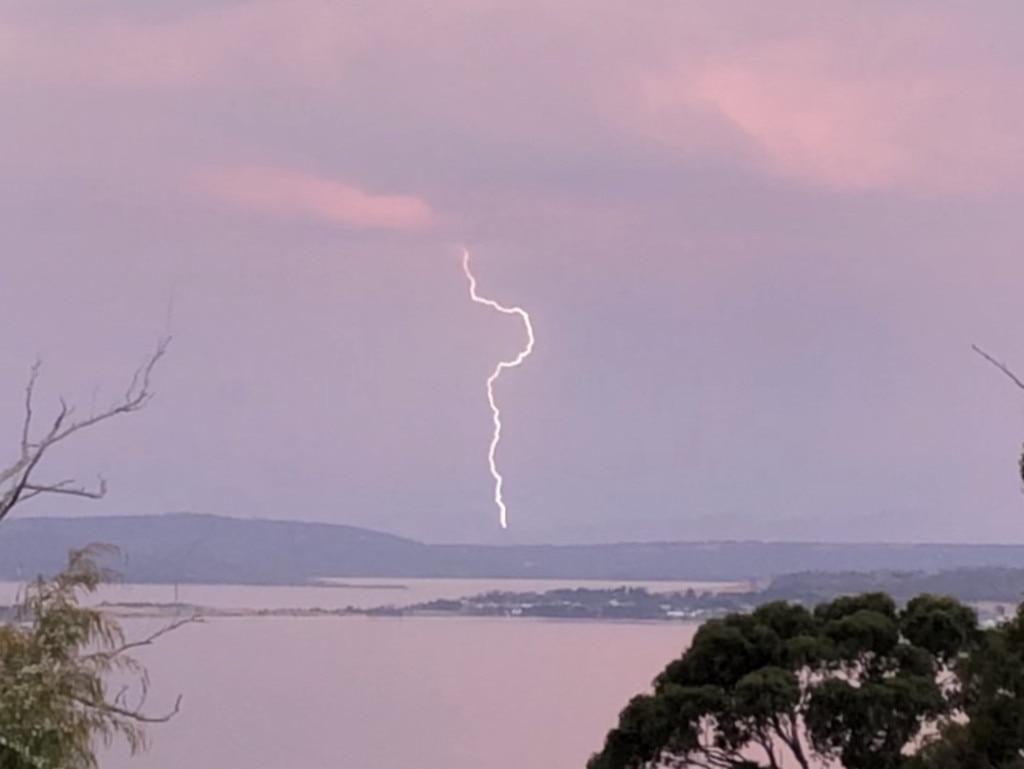 A lightning strike seen from Blackmans Bay. Picture: PHILIP YOUNG