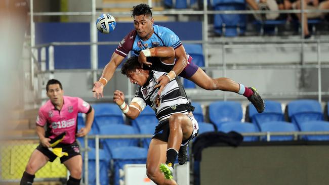 Justin Tavae leaps above Tevita Folau for the ball in a match between the Central Queensland Capras and Tweed Heads Seagulls at Cbus Super Stadium last year. Picture: Richard Gosling