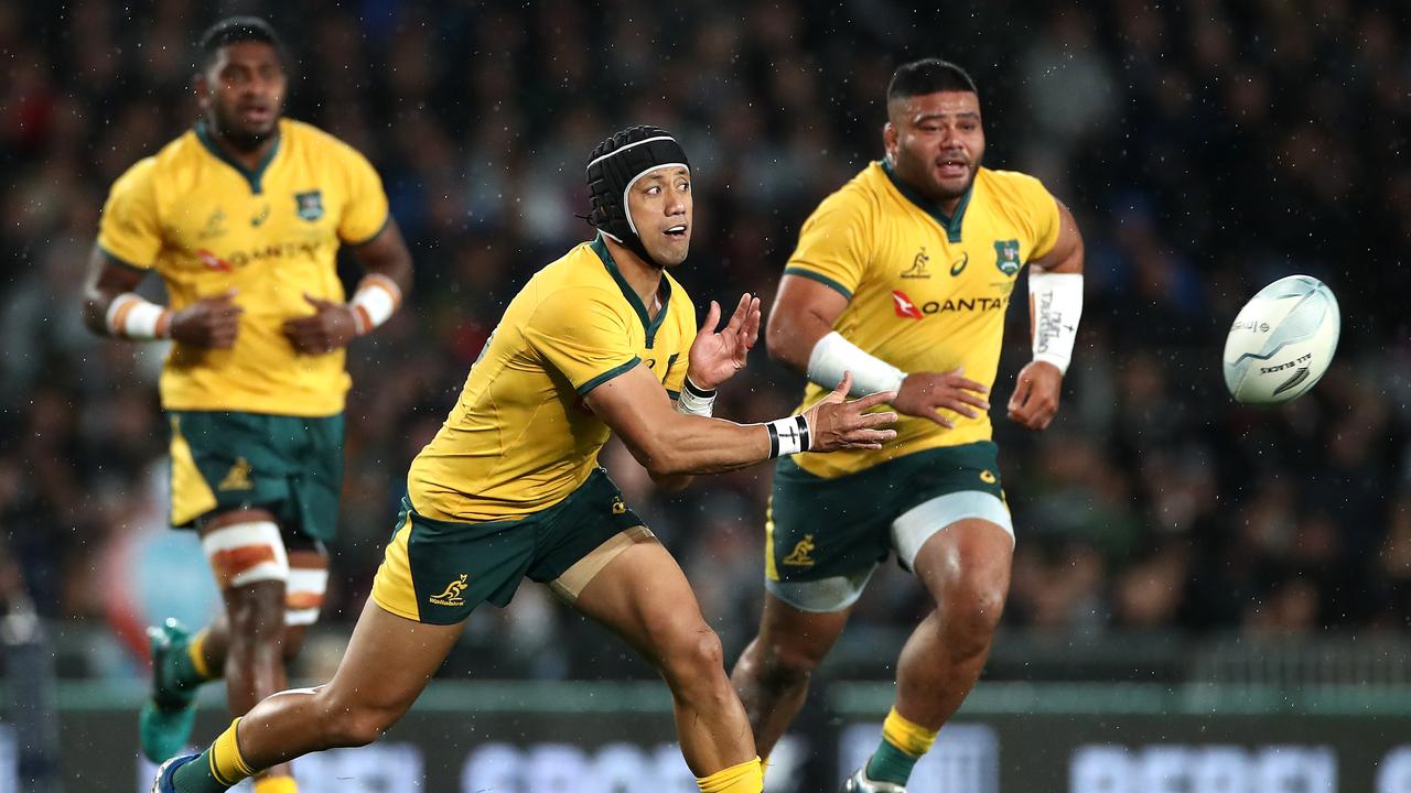 Christian Lealiifano of the Wallabies passes at Eden Park.