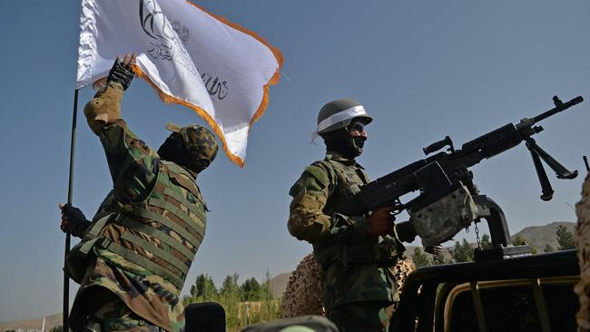 Taliban fighters stand guard on the outskirts of Kabul. Picture: AFP