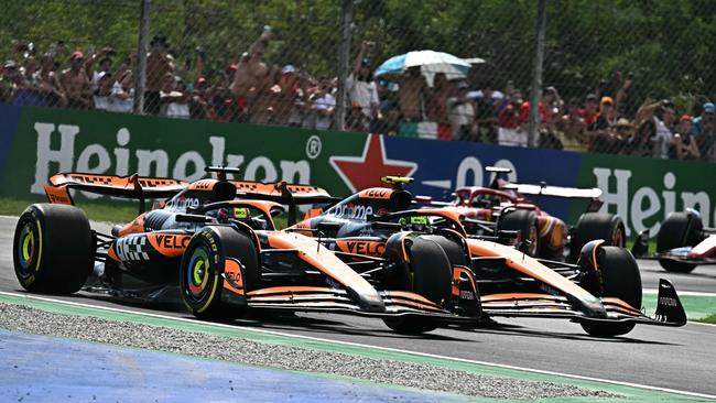 Piastri went past his teammate on the opening lap. (Photo by Gabriel BOUYS / AFP)