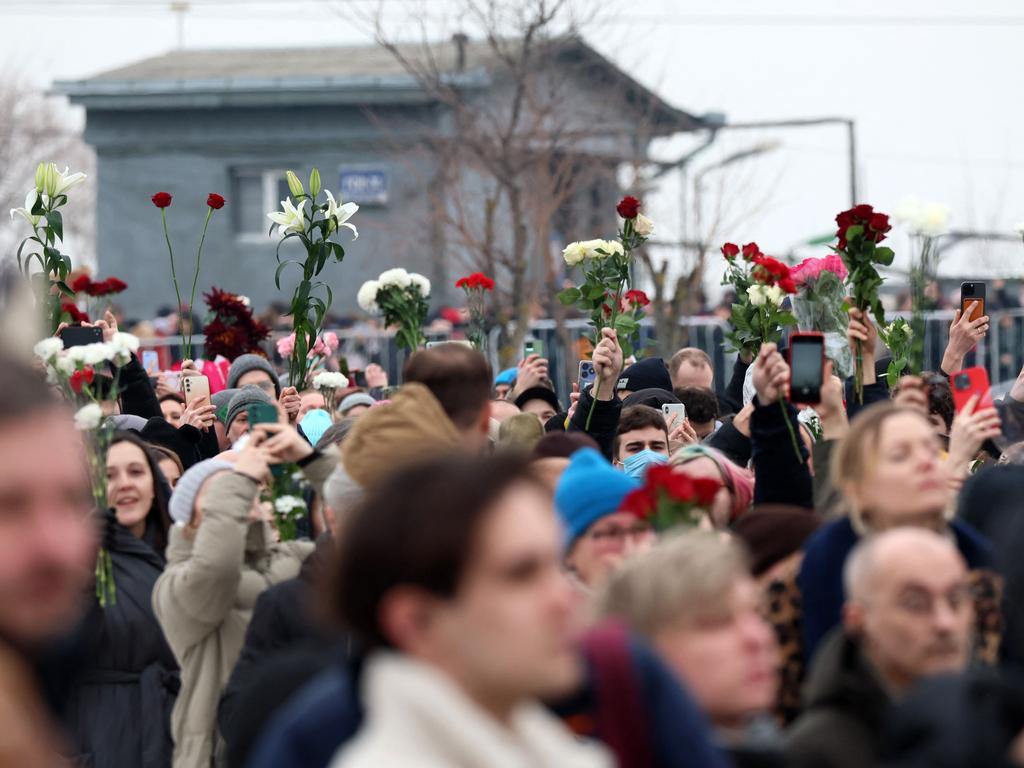 Mourners gather outside the Borisovo cemetery during the burial of late Russian opposition leader Alexei Navalny. Picture: AFP