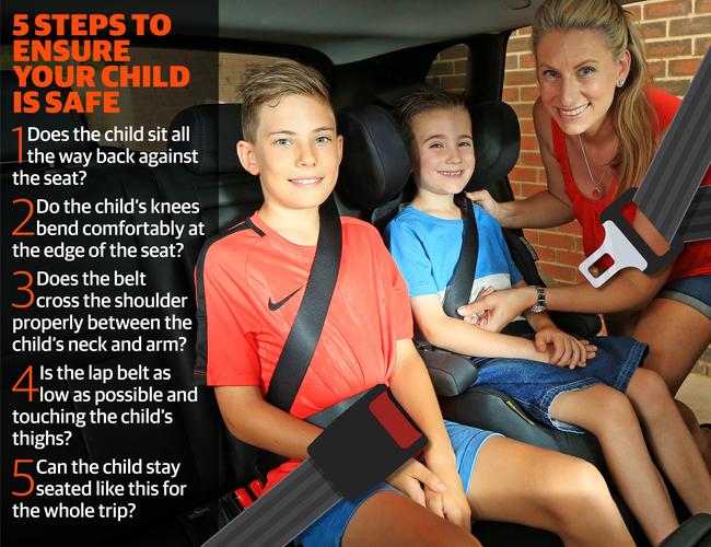 Elvira Lazar, pictured with Josh, 11, and Marcus, 6 using proper child restraints. Picture: Mark Stewart