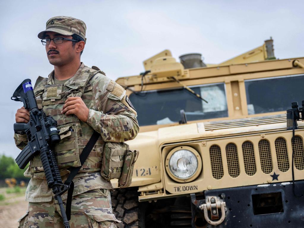 A National Guard soldier patrols the US-Mexico border. Picture: Getty Images via AFP