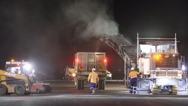 Fulton Hogan staff work to complete the $18 million Cairns Airport runway resurfacing project in 2020. PICTURE: SUPPLIED