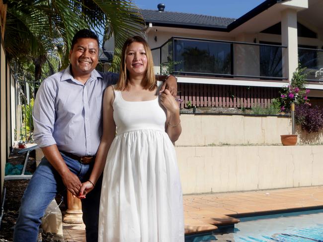 SATURDAY'S COURIER-MAIL PROPERTY SPREAD - L to R, Mahesh Kumar with Uma Mahesh Kumar, a couple with the house they recently bought for a discount of $100k, Albany Creek - on Wednesday 25th of September - Photo Steve Pohlner