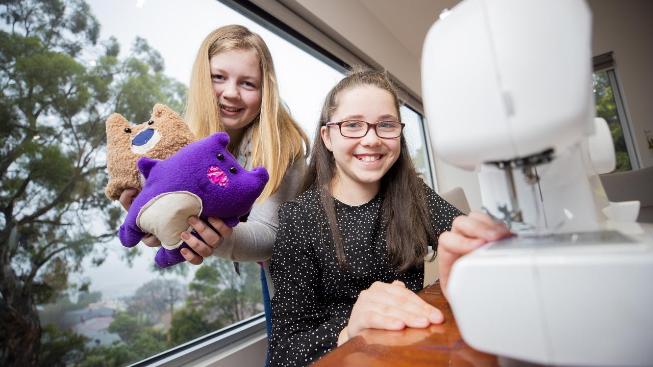 Chloe and Grace have given their ideas, time and materials to make the ISO bears for others who continue to be stuck at home. Picture: Richard Jupe