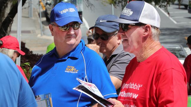 Burleigh MP Michael Hart and Labor challenger Wayne Bartholomew outside a prepoll centre on Monday. Picture: Glenn Hampson.