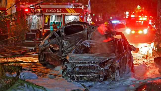 Burnt cars in the Israeli town of Holon near Tel Aviv, on May 11, 2021, after rockets were launched towards Israel from the Gaza Strip controlled by Hamas. (Picture: Ahmad GHARABLI / AFP)