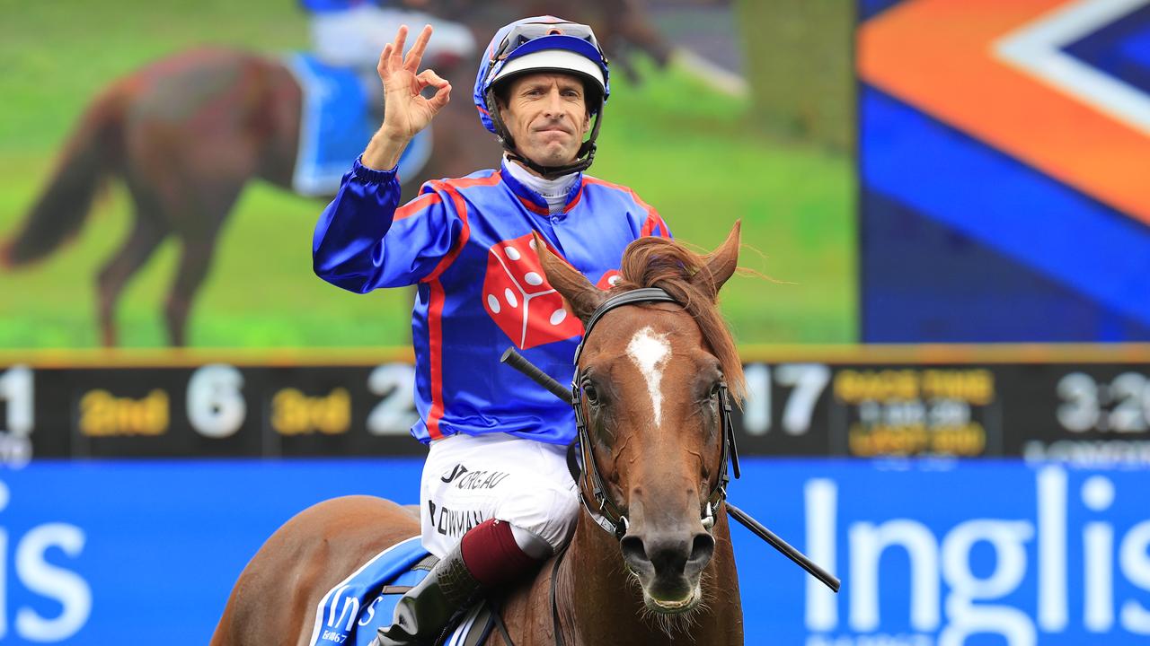 Hugh Bowman on Profiteer returns to scale after winning the Inglis Millennium. Picture: Getty