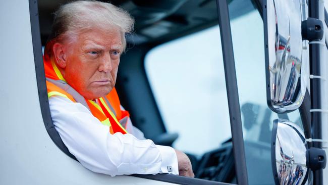 GREEN BAY, WISCONSIN - OCTOBER 30: Republican presidential nominee, former President Donald Trump holds a press conference from inside trash hauler at Green Bay Austin Straubel International Airport on October 30, 2024 in Green Bay, Wisconsin. With less than a week until Election Day, Trump is campaigning for re-election in the battleground states of North Carolina and Wisconsin.   Chip Somodevilla/Getty Images/AFP (Photo by CHIP SOMODEVILLA / GETTY IMAGES NORTH AMERICA / Getty Images via AFP)