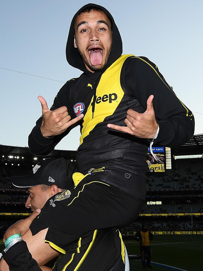 Sydney Stack joins Richmond’s premiership celebrations.