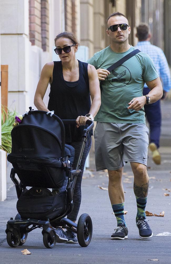 The couple head down to Rushcutter's Bay Park with baby on board.