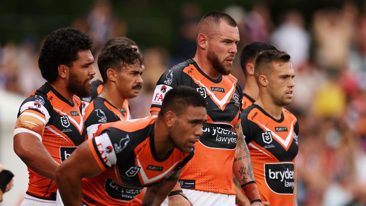 David Klemmer of the Wests Tigers and teammates look on during the Round 2. Getty