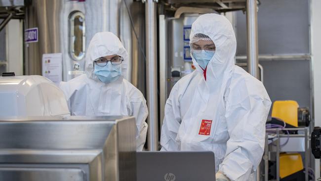 Staff at CSL working on the AstraZeneca COVID-19 vaccine. Picture: Darrian Traynor/Getty Images