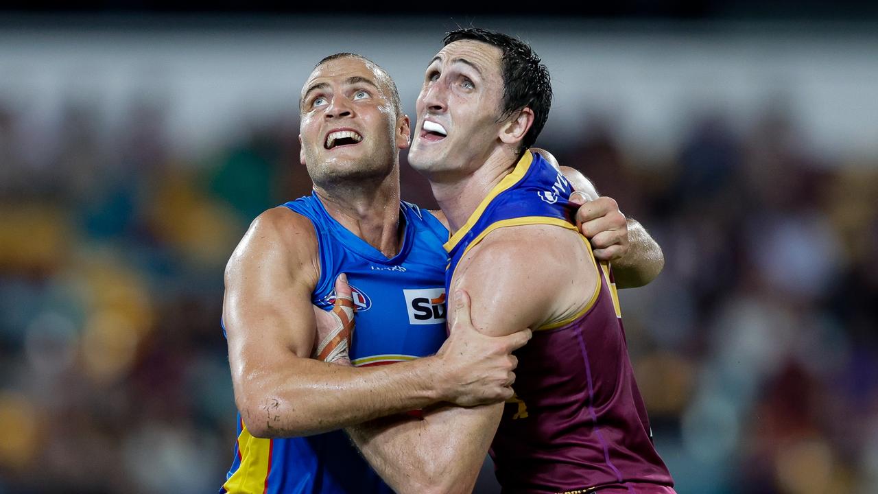 Gold Coast ruckman Jarrod Witts (left) and his Brisbane counterpart Oscar McInerney battle for supremacy at the Gabba last season. Picture: Russell Freeman/AFL Photos via Getty Images