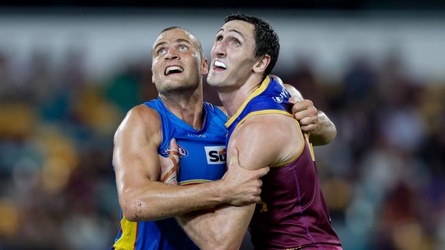 Gold Coast ruckman Jarrod Witts (left) and his Brisbane counterpart Oscar McInerney battle for supremacy at the Gabba last season. Picture: Russell Freeman/AFL Photos via Getty Images