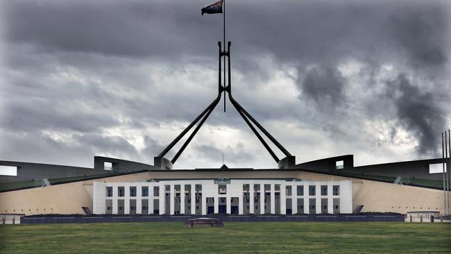 CANBERRA, AUSTRALIA NewsWire Photos - SEPTEMBER 20, 2021: COVID-19 and bad weather has kept most Canberrans inside as the ACT records 7 new cases. Storm clouds gather over Parliament House in Canberra.Picture: Newswire/Gary Ramage