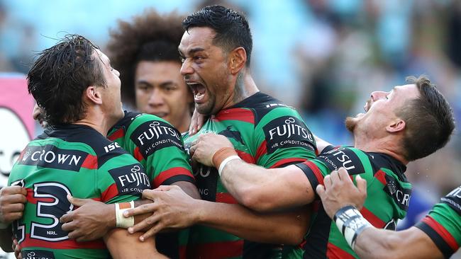 Cameron Murray of the Rabbitohs celebrates with John Sutton after the matchwinning try.