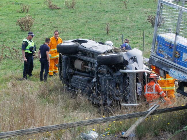 ELECTION TEAM 2022 LIBERAL BUS TOUR 14/4/2022  3 occupants crash their car and roll on the road to Davenport from Launceston Tasmania. Picture: Jason Edwards