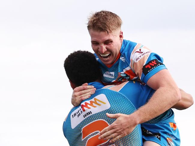 Pride's Will Partridge celebrates with Robert Derby after he scores a try in the Hostplus Cup Queensland Rugby League (QRL) match between the Northern Pride and the Sunshine Coast Falcons, held at Barlow Park, Cairns Picture: Brendan Radke