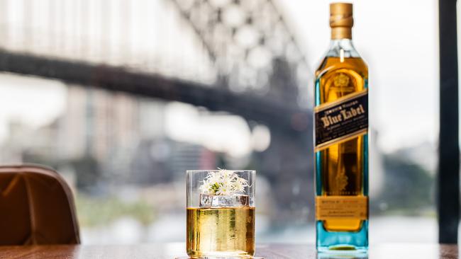 Australians are increasingly reaching for a Johnnie Walker Black from the drinks cabinet instead of the more expensive Johnnie Walker Blue.