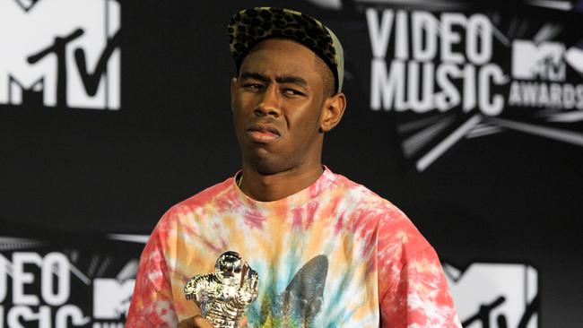 FILE - This Aug. 28, 2011 file photo shows Tyler the Creator posing backstage with the award for best new artist backstage at the MTV Video Music Awards in Los Angeles. PepsiCo said it immediately pulled the 60-second Mountain Dew ad after learning that people found it was offensive. The ad was part of a series developed by African-American rapper Tyler, The Creator, and depicted a battered white woman on crutches being urged to identify a suspect out of a lineup of black men.(AP Photo/Chris Pizzello, file)