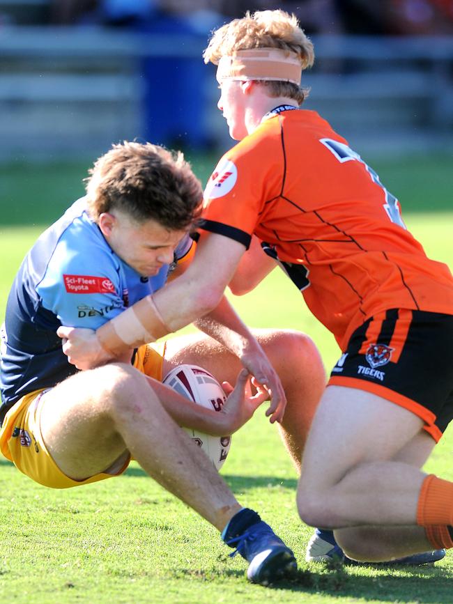 Norths Jalen Afamasaga is tackled. Picture, John Gass