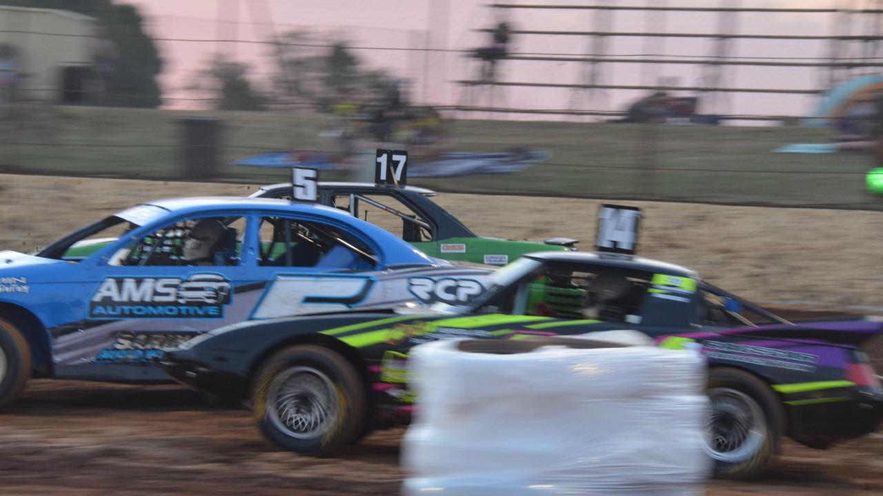 CLOSE: Nathan Lowe and Cameron Taylor try to overtake lead driver Cameron Birch during the third modified sedan heat and at the Kingaroy Speedway on Saturday, November 16. (Photo: Jessica McGrath/ South Burnett Times)