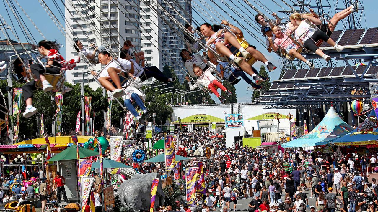 A capacity crowd of 60,000 people enjoy perfect weather on Good Friday. The view along Olympic Boulevard. Picture: Toby Zerna