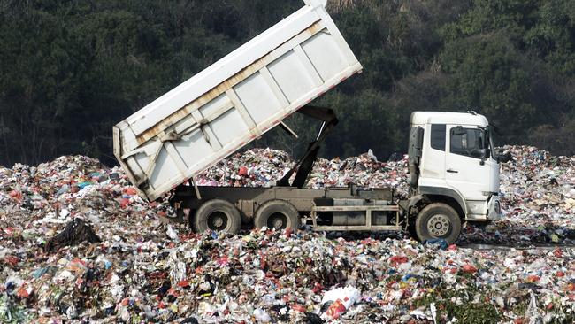 Waster from NSW landfill sites is being dug up and transported to Queensland to be buried again.