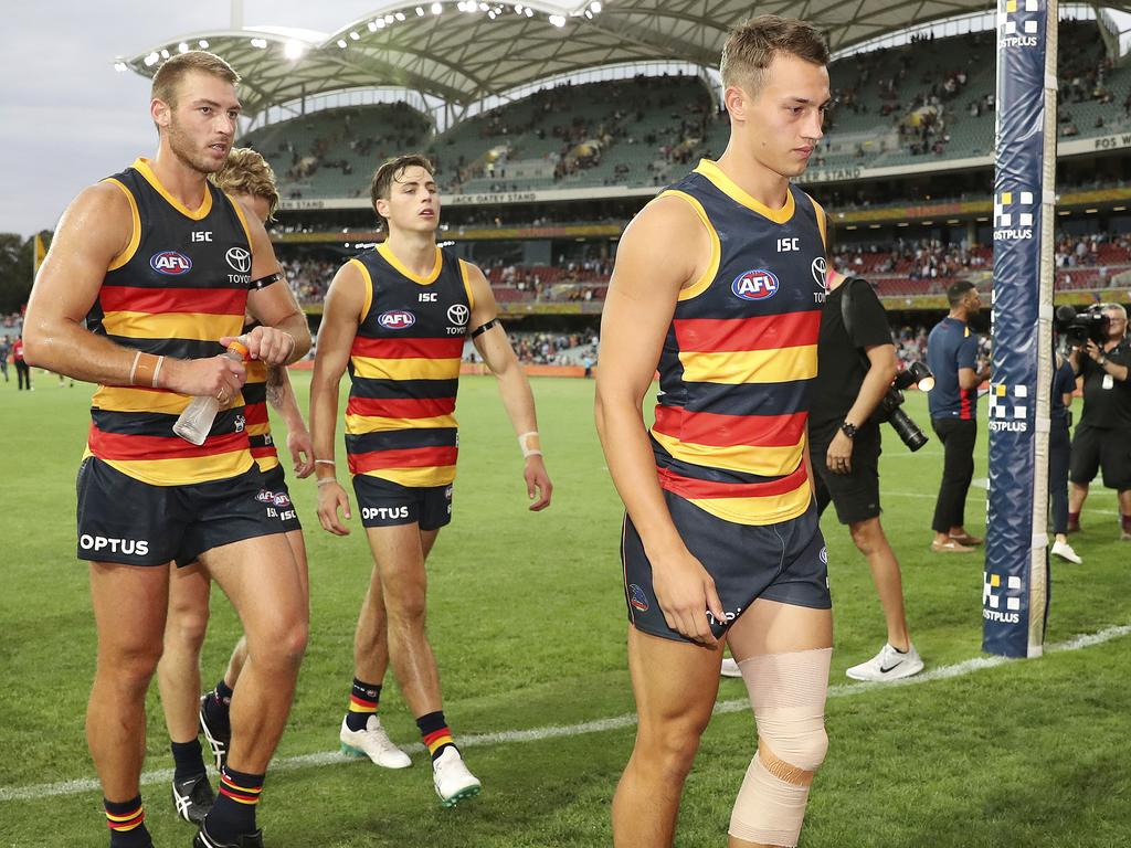 Tom Doedee walks off after suffering a year ending ACL injury. Picture: Sarah Reed