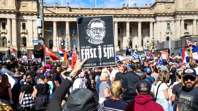 Anti-government protesters march through the streets of Melbourne. Picture: Ian Currie