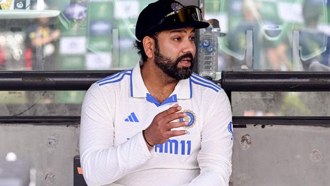 India's captain Rohit Sharma waits for the after-match presentation on on the third day of the second cricket Test match between Australia and India at the Adelaide Oval in Adelaide on December 8, 2024. (Photo by William WEST / AFP) / -- IMAGE RESTRICTED TO EDITORIAL USE - STRICTLY NO COMMERCIAL USE --