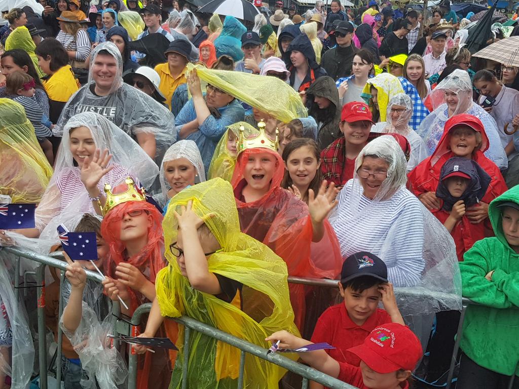 Excited Dubbo locals brave the rain. Picture: Candace Sutton