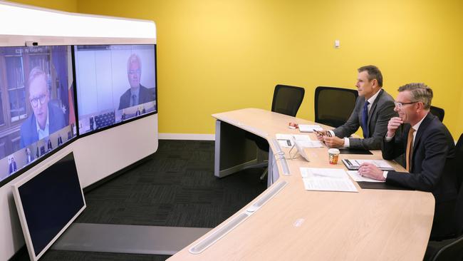 NSW Premier Dominic Perrottet and DPC Secretary Michael Coutts-Trotter prepare for Friday’s virtual national cabinet meeting. Picture: Toby Zerna/Office of NSW Premier