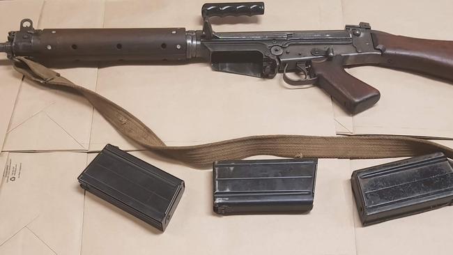 A L1A1 self loading rifle seized by Strike Force Colenso investigators. Picture: NSW Police