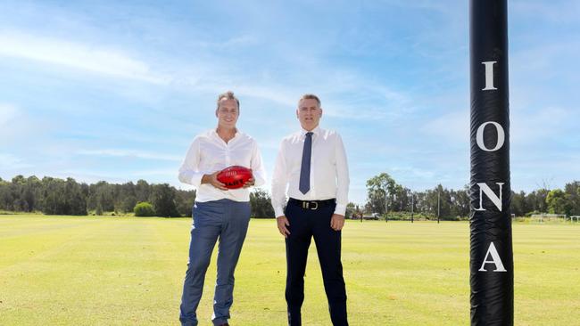 Pictured are Damien Mitchelmore (AFL Venue & Government Partnerships Manager, QLD), and Iona College Principal Trevor Goodwin.