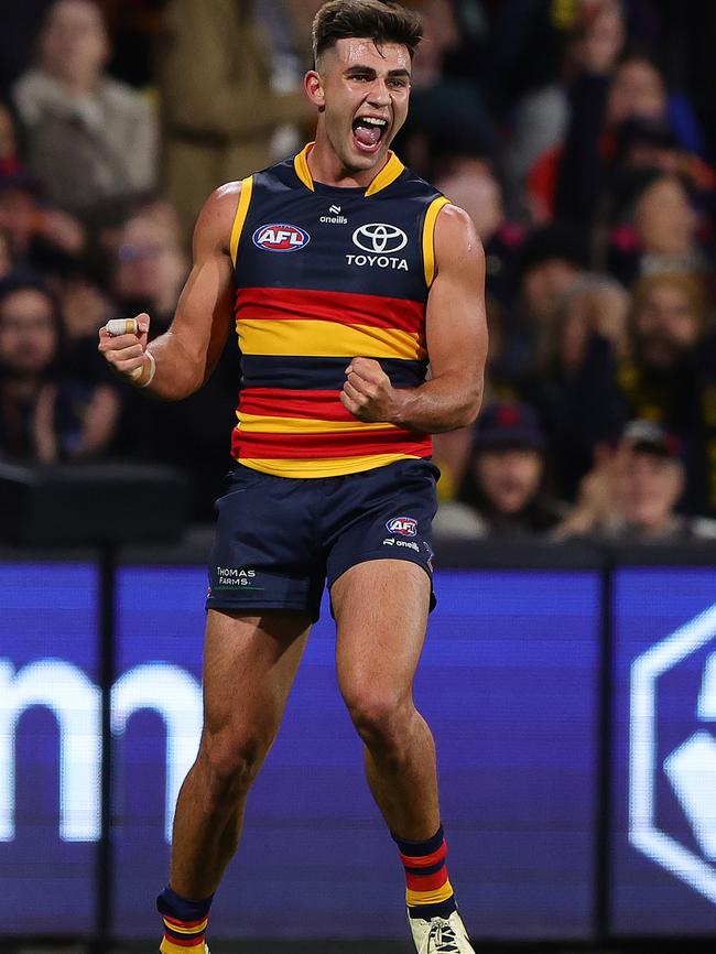 Josh Rachele celebrates kicking a goal against the Bombers. Picture: Sarah Reed