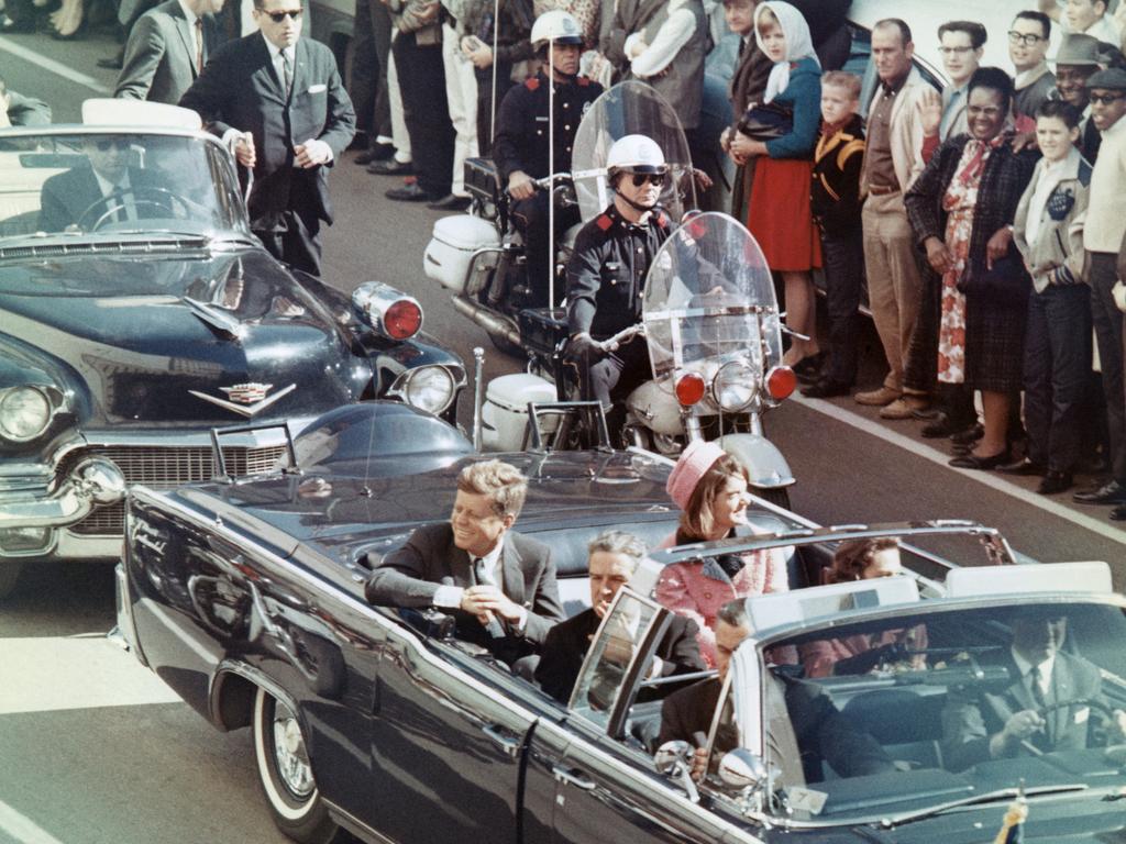 President and Mrs. John F. Kennedy smile at the crowds lining their motorcade route in Dallas, Texas, on November 22, 1963. Minutes later the President was assassinated as his car passed through Dealey Plaza. Picture: file image