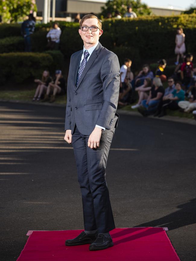 Matthew Simmons arrives at Harristown State High School formal at Highfields Cultural Centre, Friday, November 18, 2022. Picture: Kevin Farmer