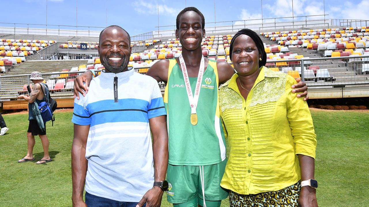 Under 14 High Jumper Alikana Malish with mum and dad Hassan and Flowra. Picture, John Gass