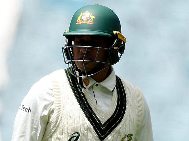 Australia's Usman Khawaja leaves the field after being dismissed on day four of the fourth cricket Test match between Australia and India at the Melbourne Cricket Ground (MCG) in Melbourne on December 29, 2024. (Photo by Martin KEEP / AFP) / -- IMAGE RESTRICTED TO EDITORIAL USE - STRICTLY NO COMMERCIAL USE --